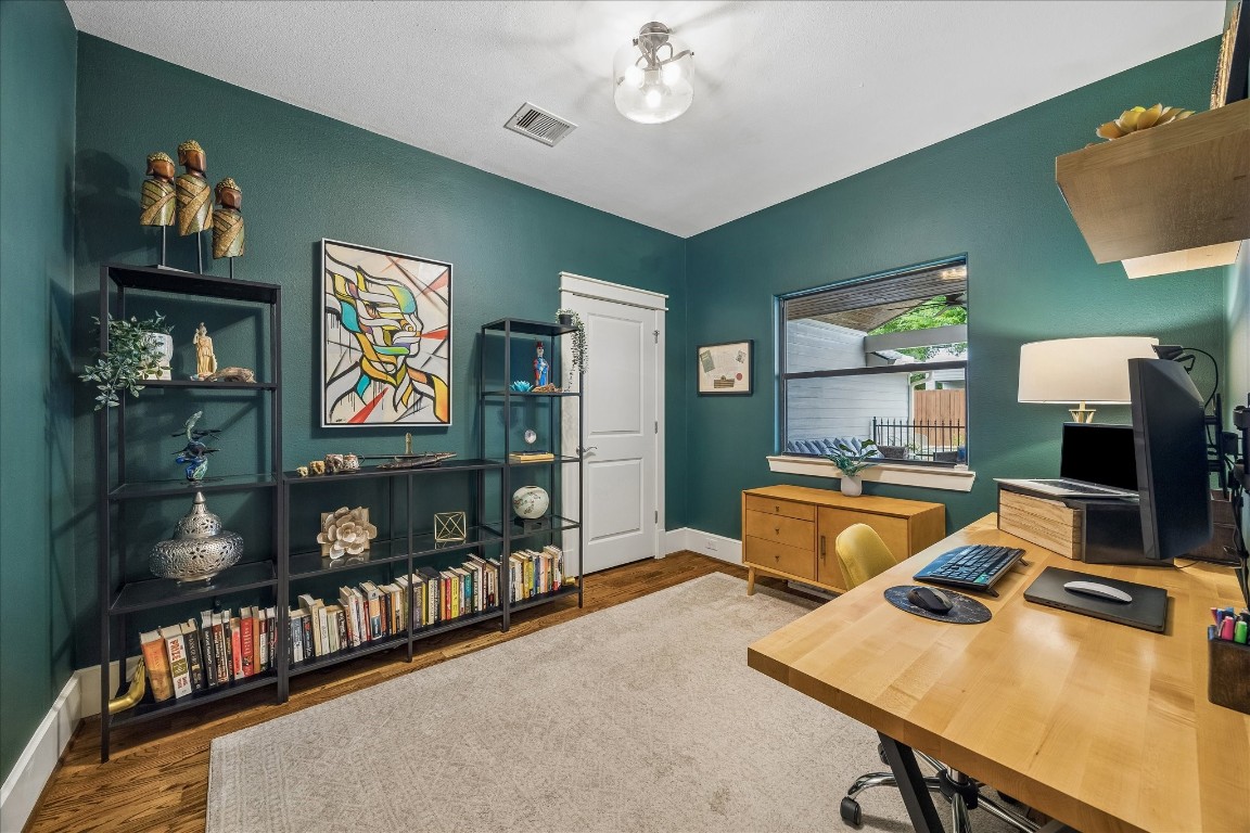 1722 Lamonte Lane Houston, TX 77018 - Photo 20 of 34 a living room with furniture and a flat screen tv