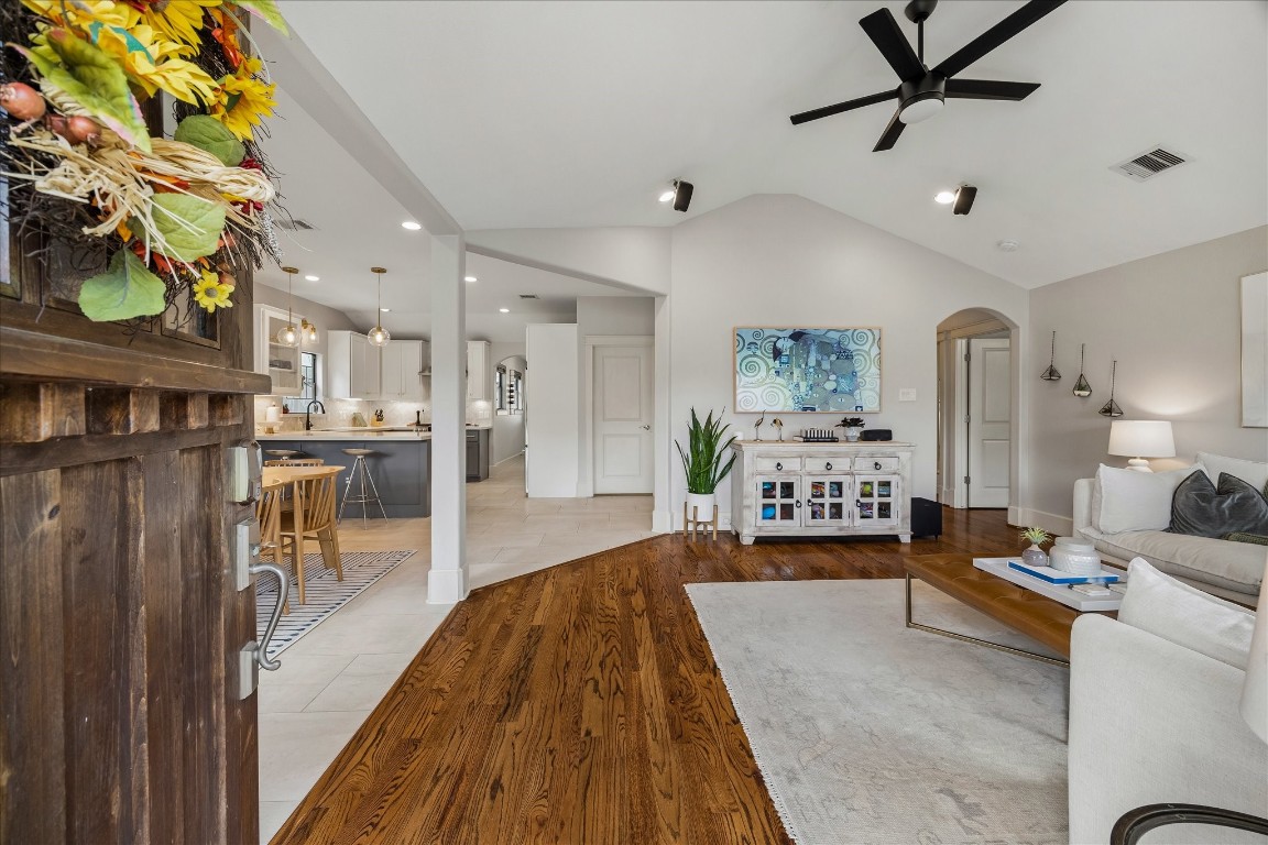 1722 Lamonte Lane Houston, TX 77018 - Photo 2 of 34 a living room with stainless steel appliances furniture and a kitchen view