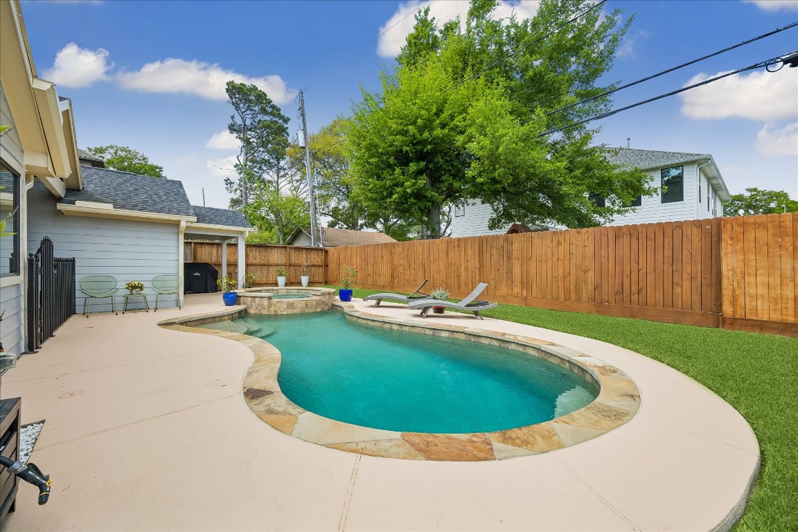 1722 Lamonte Lane Houston, TX 77018 - Photo 26 of 34 a view of backyard with swimming pool and outdoor seating