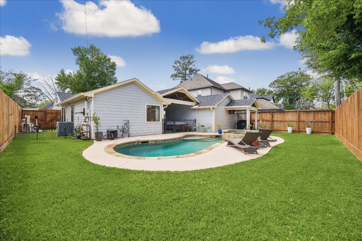 1722 Lamonte Lane Houston, TX 77018 - Photo 28 of 34 a view of a house with a backyard porch and sitting area
