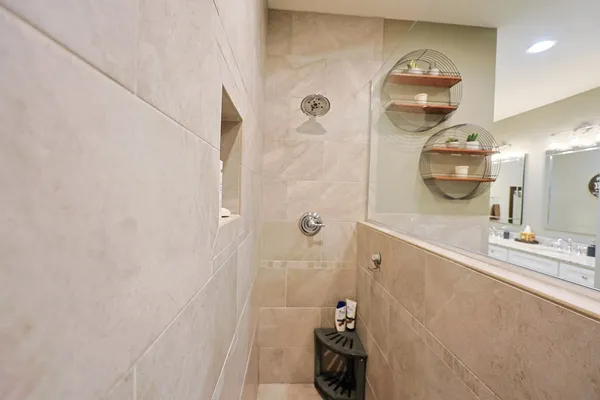 a bathroom with a sink and mirror