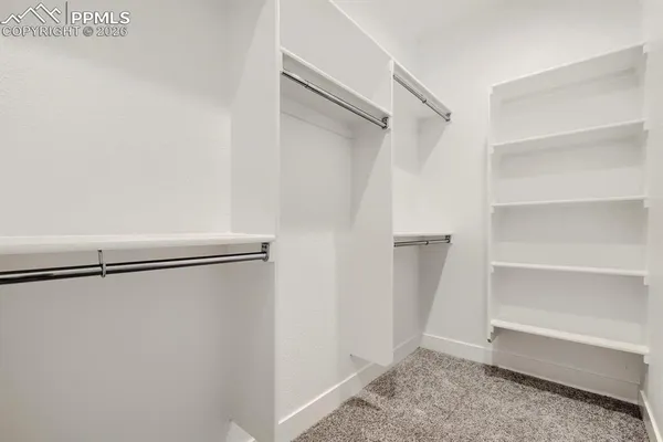 a view of an empty walk in closet