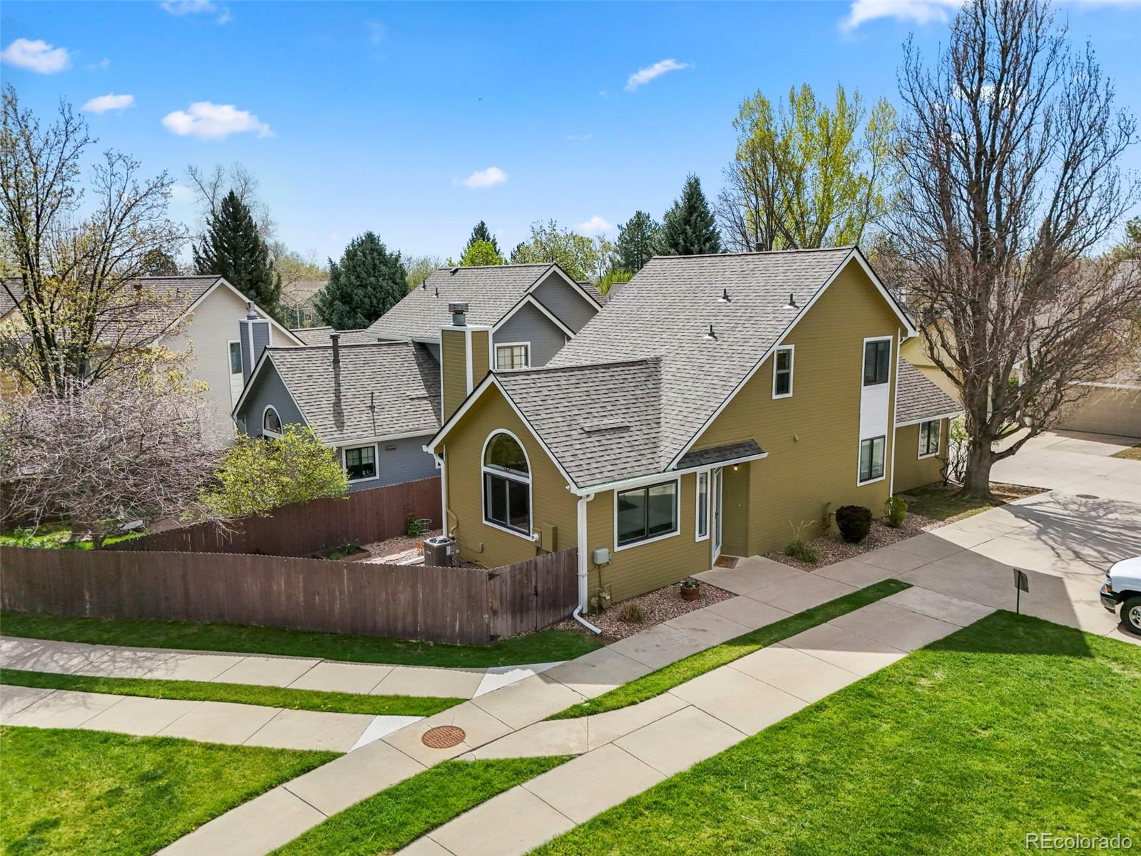 4829 Baldwin Place Boulder, CO 80301 - Photo 2 of 45 a front view of a house with a yard