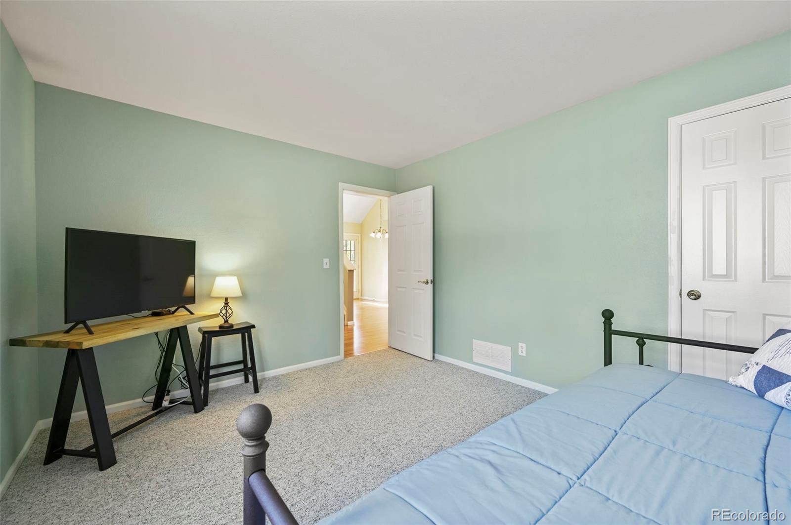 4829 Baldwin Place Boulder, CO 80301 - Photo 21 of 45 a bedroom with a workspace