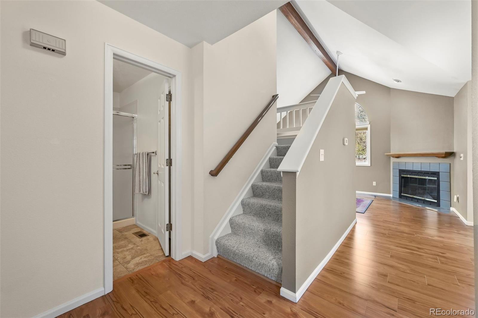 4829 Baldwin Place Boulder, CO 80301 - Photo 23 of 45 a view of entryway and hall with wooden floor