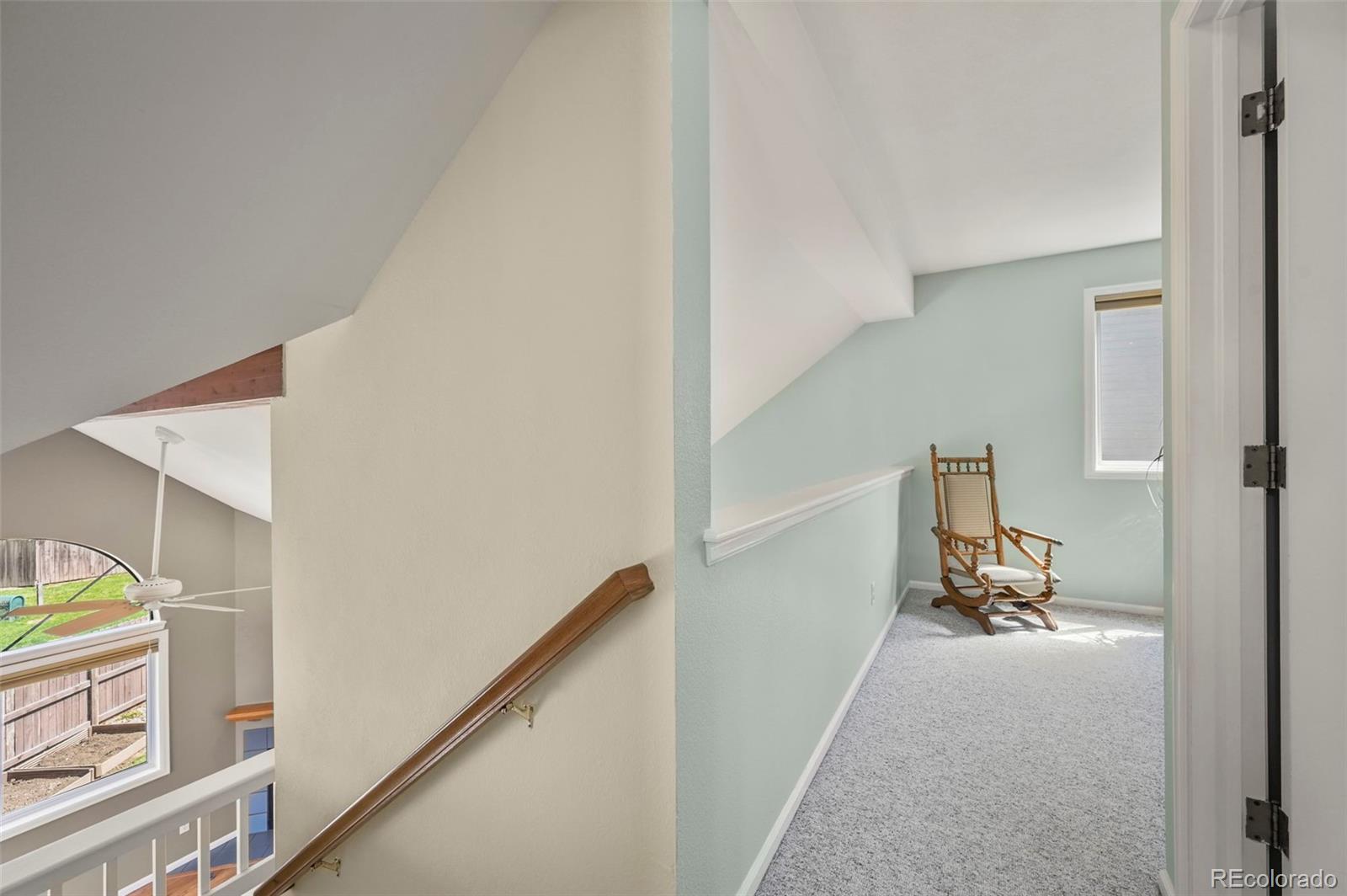 4829 Baldwin Place Boulder, CO 80301 - Photo 24 of 45 a view of a hallway with furniture and a window