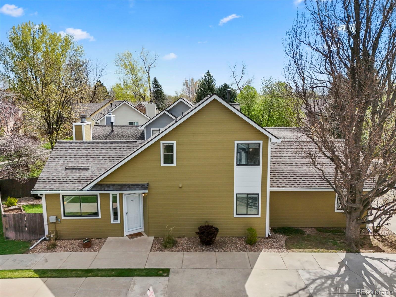 4829 Baldwin Place Boulder, CO 80301 - Photo 3 of 45 a view of a house with a yard