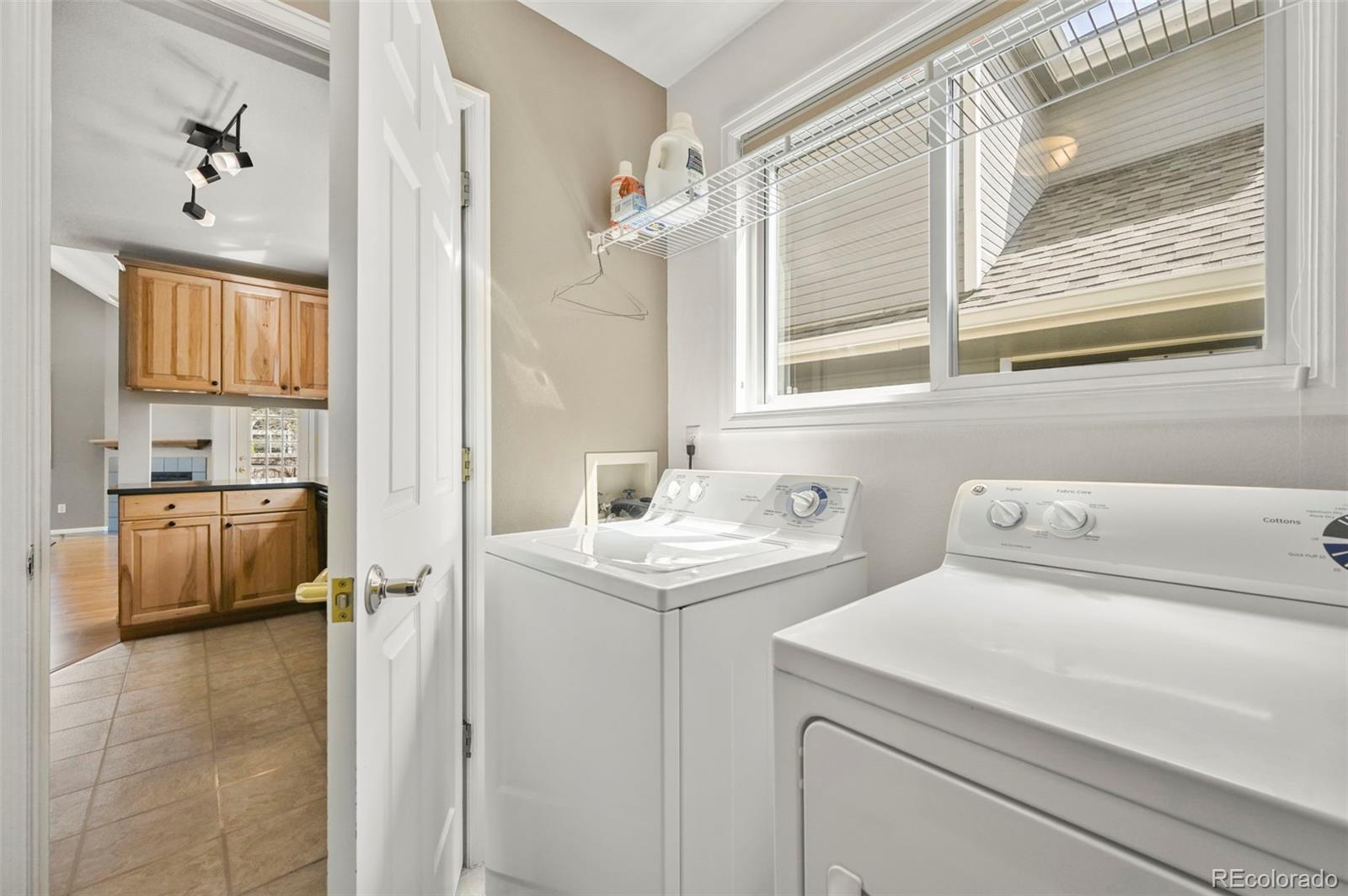 4829 Baldwin Place Boulder, CO 80301 - Photo 31 of 45 a bathroom with a sink and a washing machine