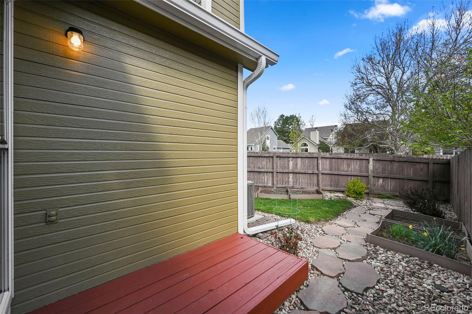 4829 Baldwin Place Boulder, CO 80301 - Photo 33 of 45 a view of a backyard with sitting area