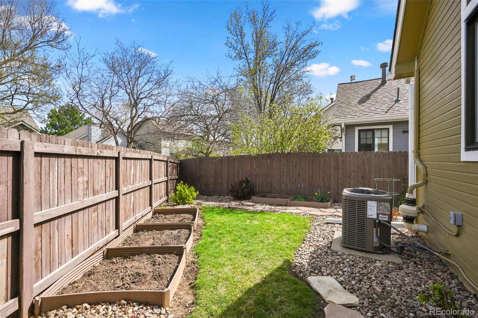 4829 Baldwin Place Boulder, CO 80301 - Photo 34 of 45 a view of a backyard with wooden fence
