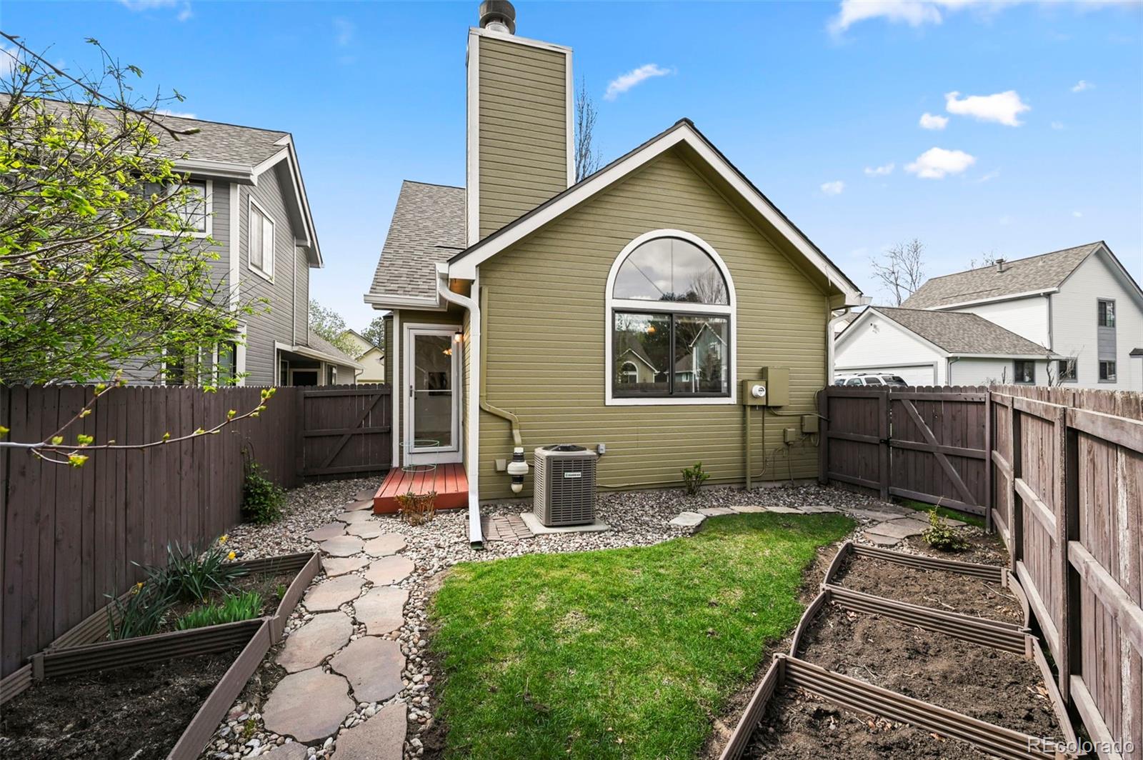 4829 Baldwin Place Boulder, CO 80301 - Photo 35 of 45 a front view of a house with garden