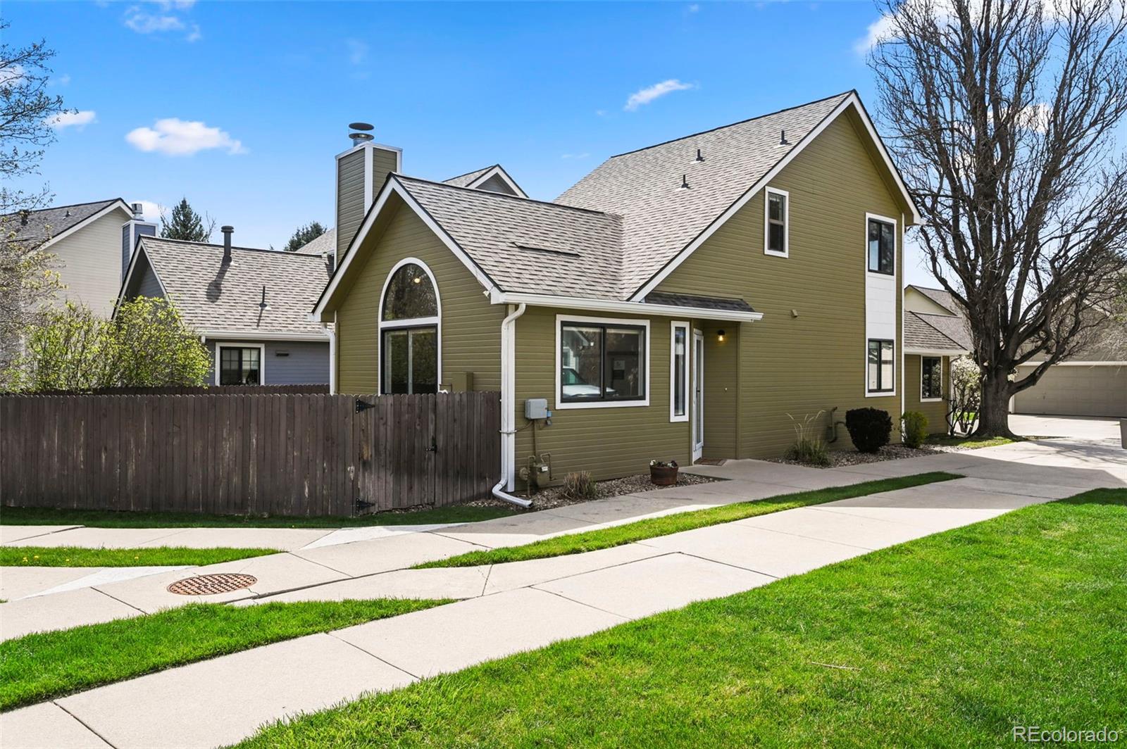 4829 Baldwin Place Boulder, CO 80301 - Photo 37 of 45 a view of a house with a yard and large tree