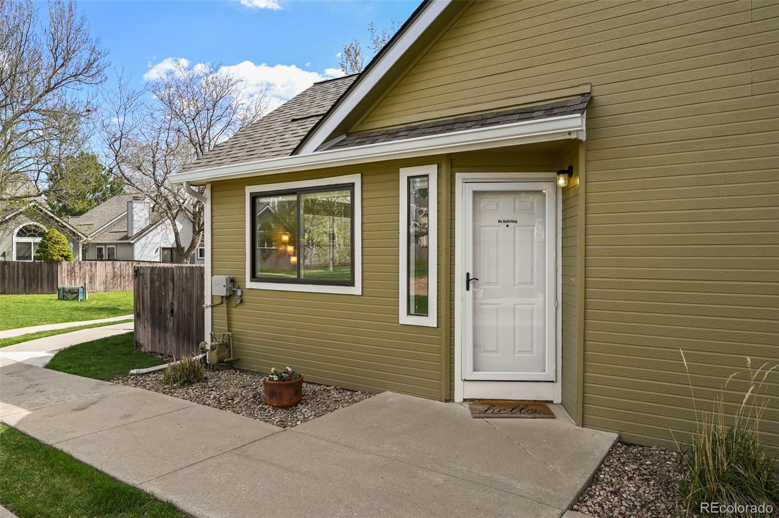 4829 Baldwin Place Boulder, CO 80301 - Photo 6 of 45 a front view of a house with garden