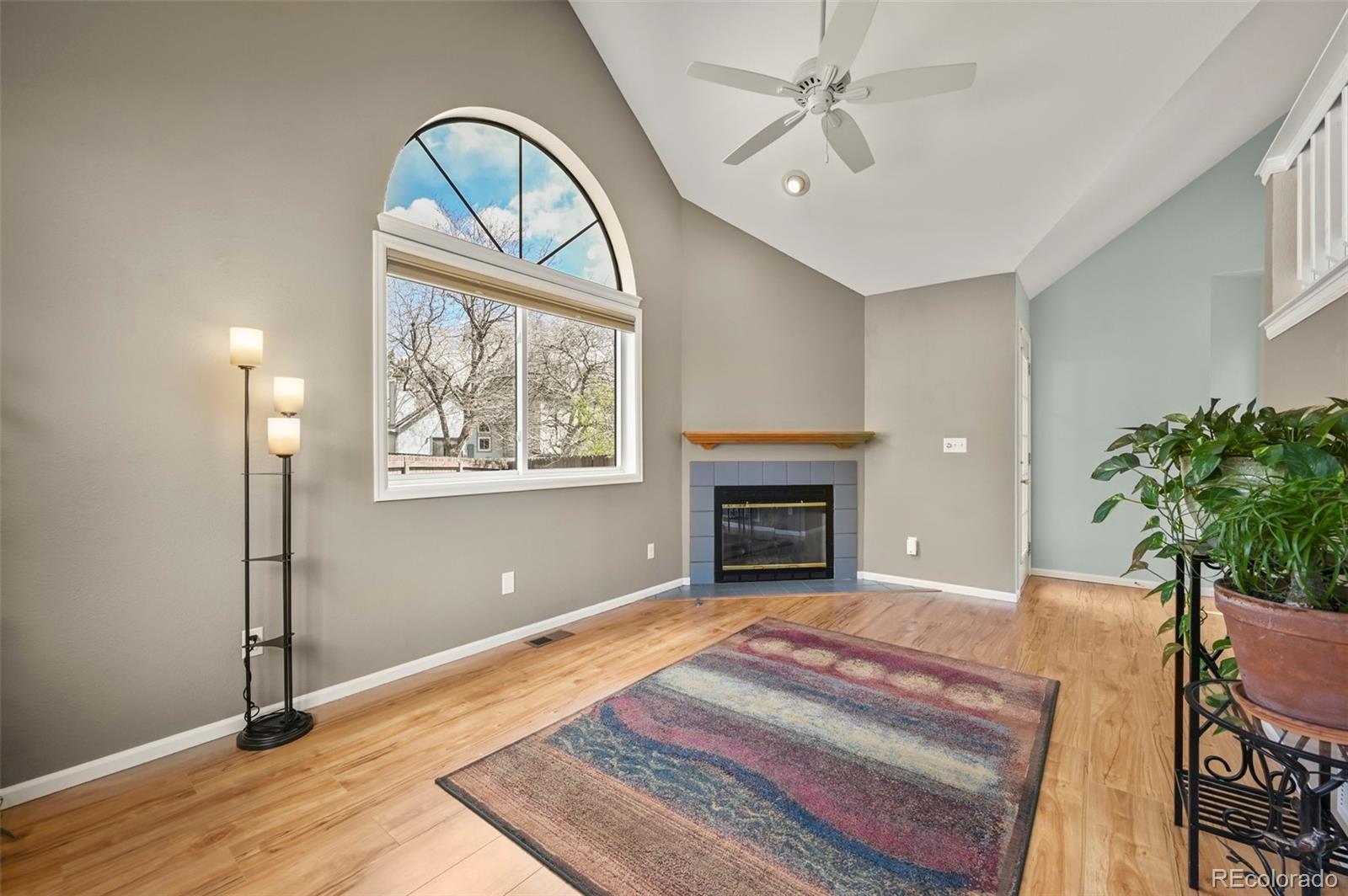 4829 Baldwin Place Boulder, CO 80301 - Photo 10 of 45 a bedroom with a bed and a chandelier