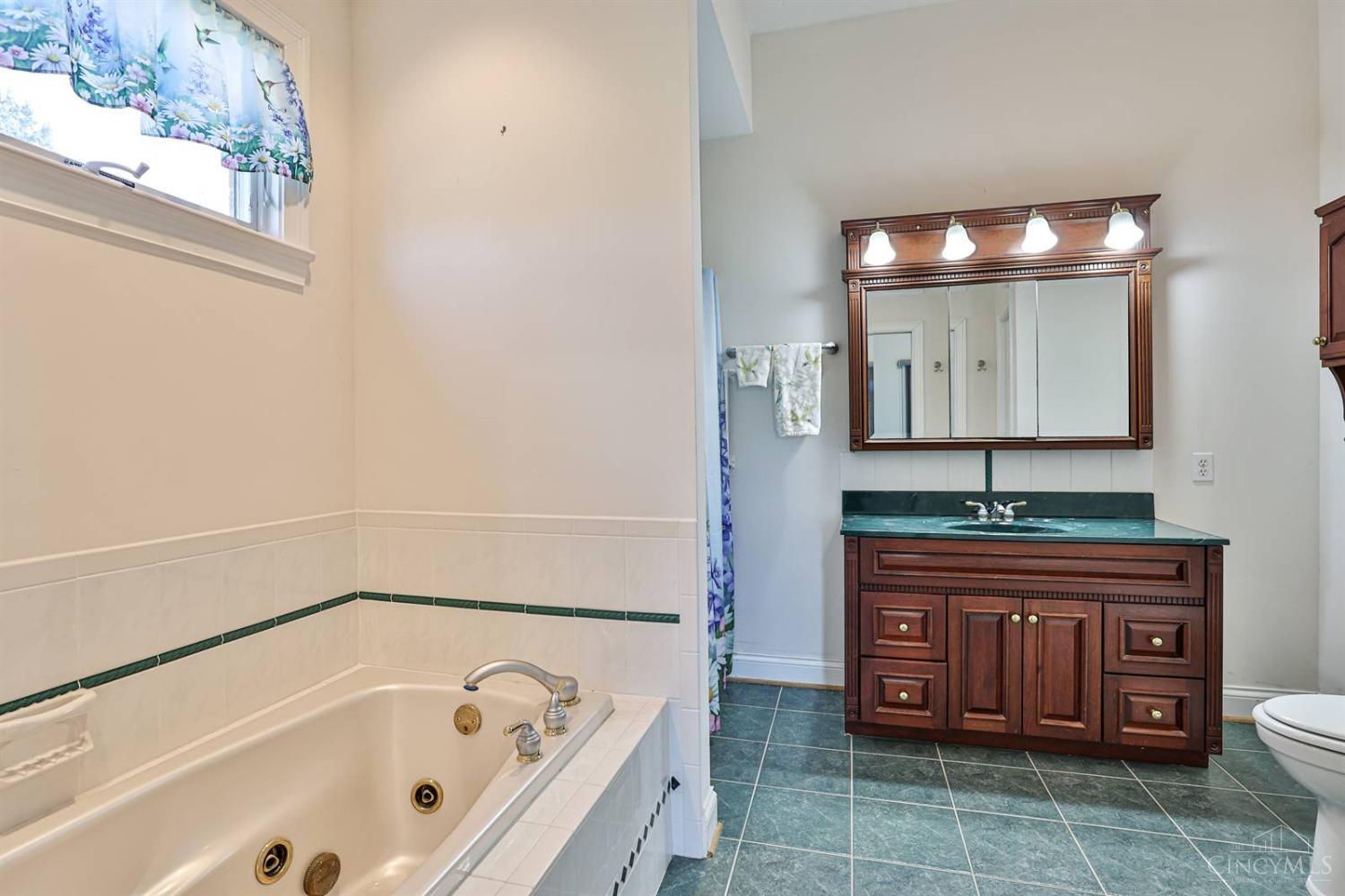 7248 Princeton Road Middletown, OH 45044 - Photo 27 of 66 Primary bath with jetted tub and shower