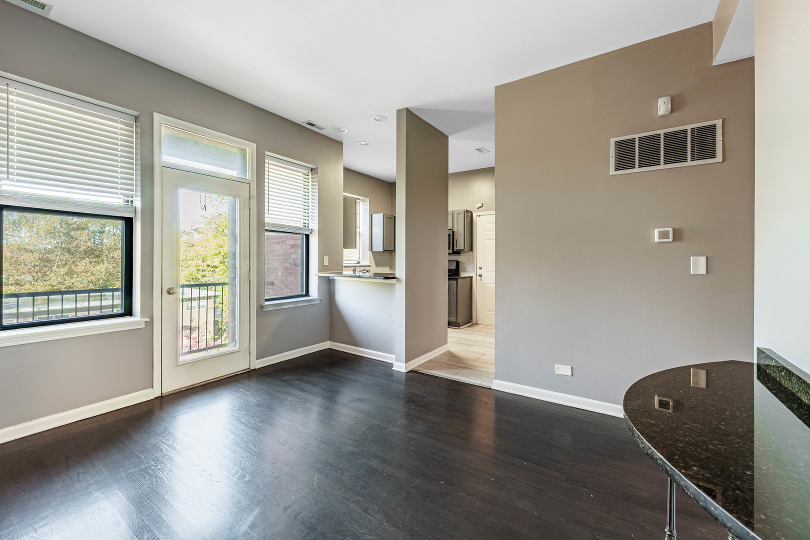 3704 South King Drive, Unit 3C Chicago, IL 60653 - Photo 13 of 26 a view of a livingroom with furniture and wooden floor