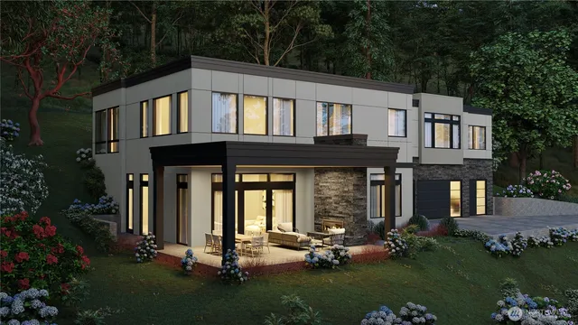 a front view of a house with a garden