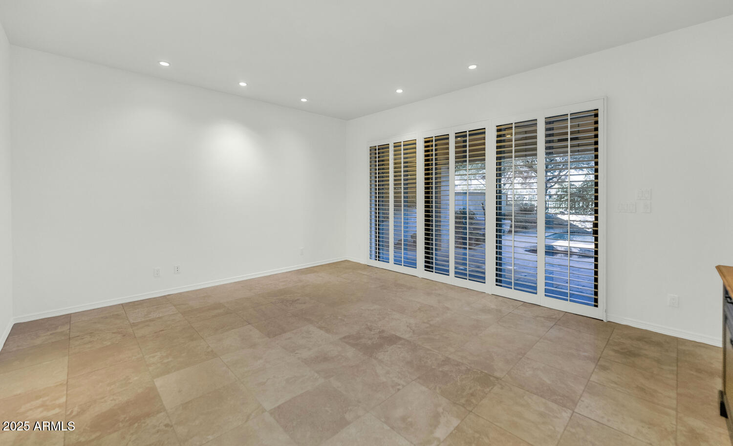 7878 East Gainey Ranch Road, Unit 25 Scottsdale, AZ 85258 - Photo 16 of 42 a view of an empty room with a window
