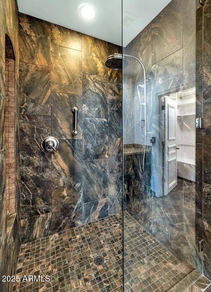 7878 East Gainey Ranch Road, Unit 25 Scottsdale, AZ 85258 - Photo 20 of 42 a bathroom with a shower