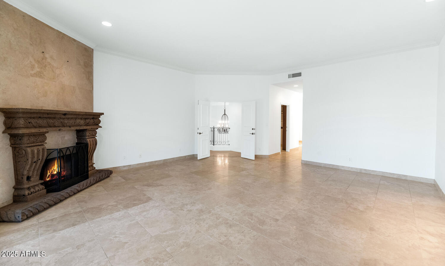 7878 East Gainey Ranch Road, Unit 25 Scottsdale, AZ 85258 - Photo 24 of 42 a view of an empty room with fire place and a fireplace