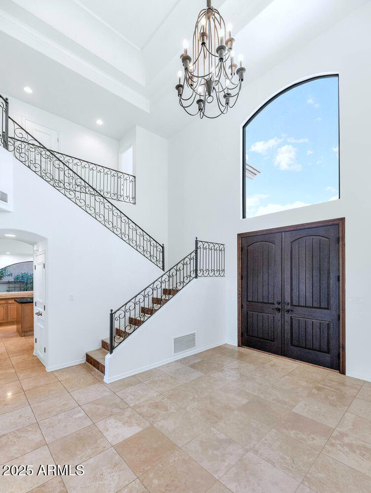 7878 East Gainey Ranch Road, Unit 25 Scottsdale, AZ 85258 - Photo 3 of 42 a view of a hallway with entryway