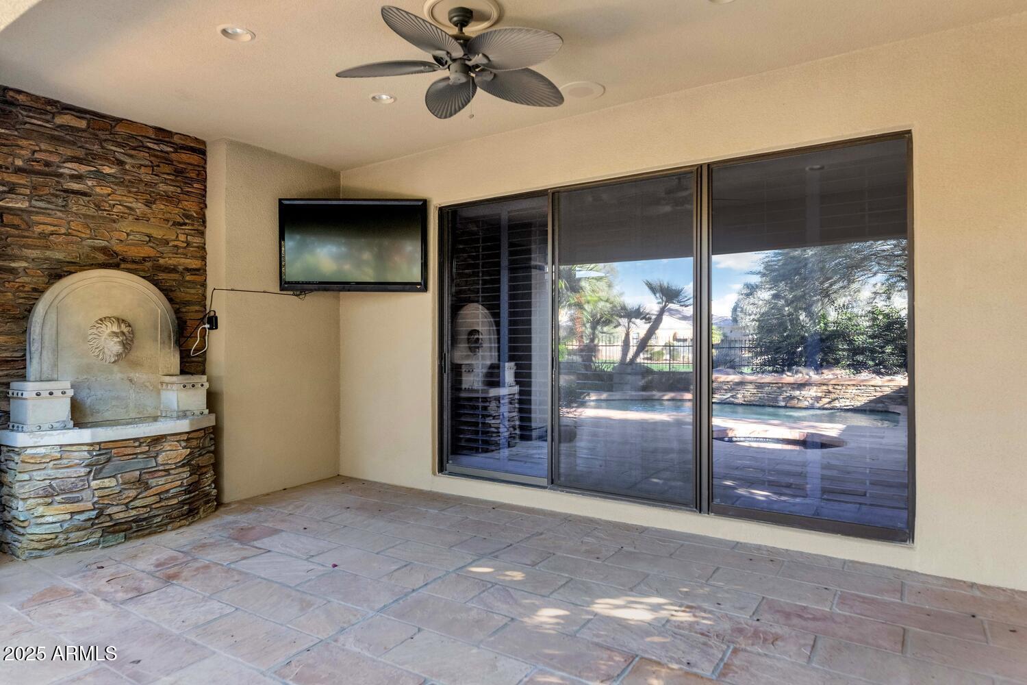 7878 East Gainey Ranch Road, Unit 25 Scottsdale, AZ 85258 - Photo 32 of 42 a view of a livingroom with a furniture and fireplace