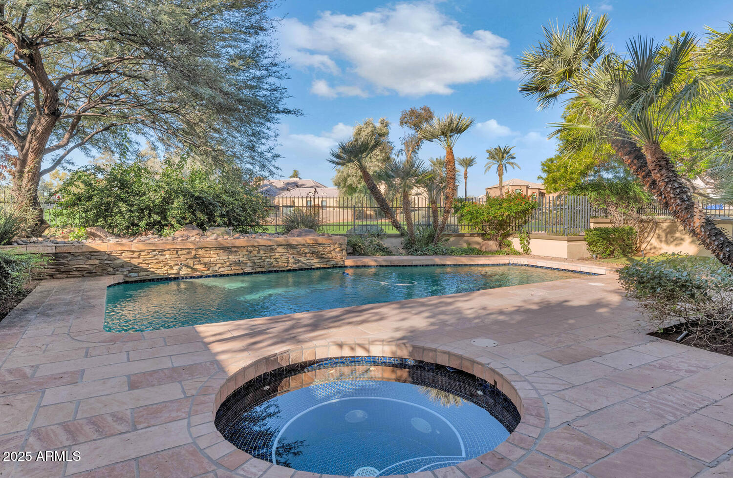 7878 East Gainey Ranch Road, Unit 25 Scottsdale, AZ 85258 - Photo 35 of 42 a view of swimming pool from a lake