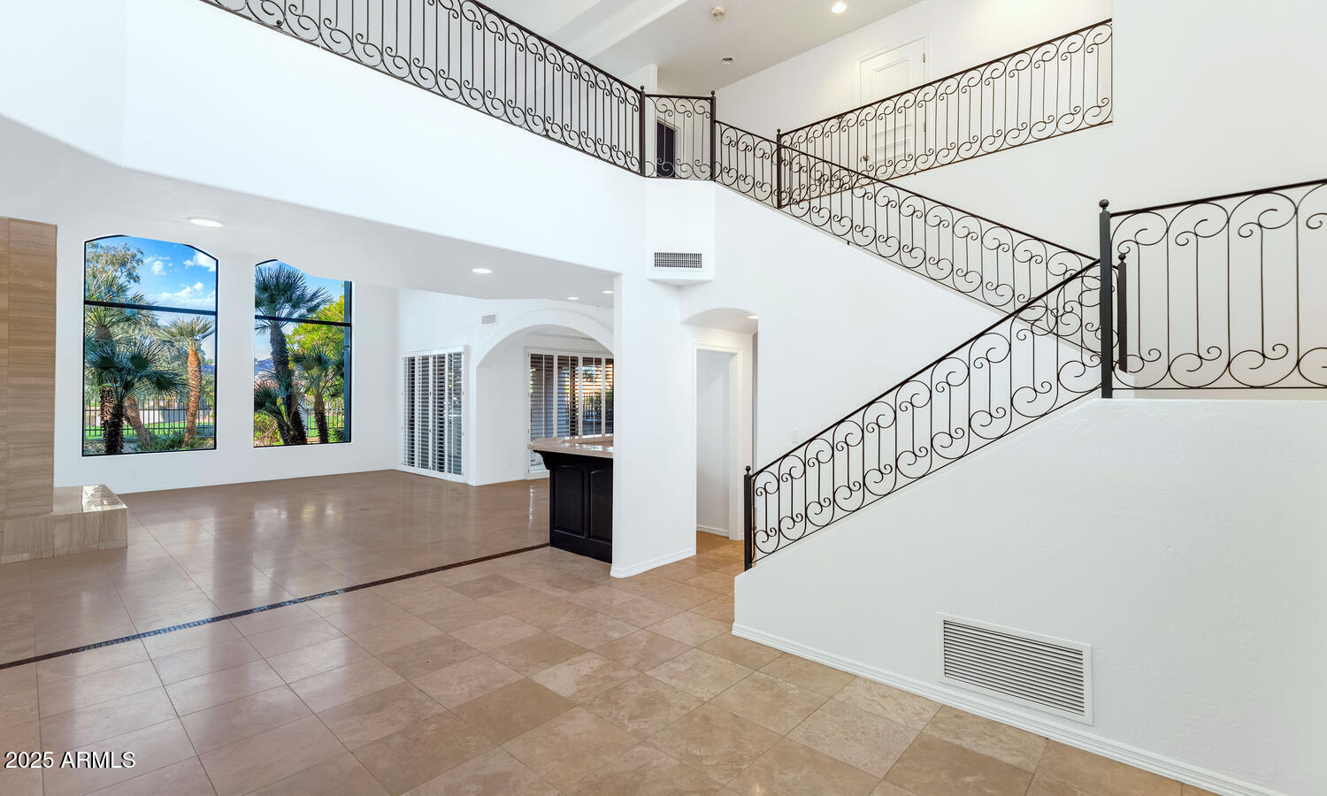 7878 East Gainey Ranch Road, Unit 25 Scottsdale, AZ 85258 - Photo 4 of 42 a view of entryway and hall with wooden floor