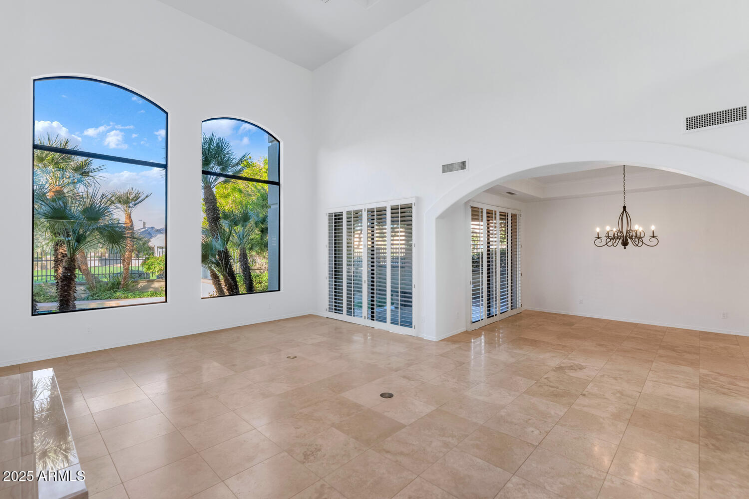 7878 East Gainey Ranch Road, Unit 25 Scottsdale, AZ 85258 - Photo 7 of 42 a view of an empty room with a window