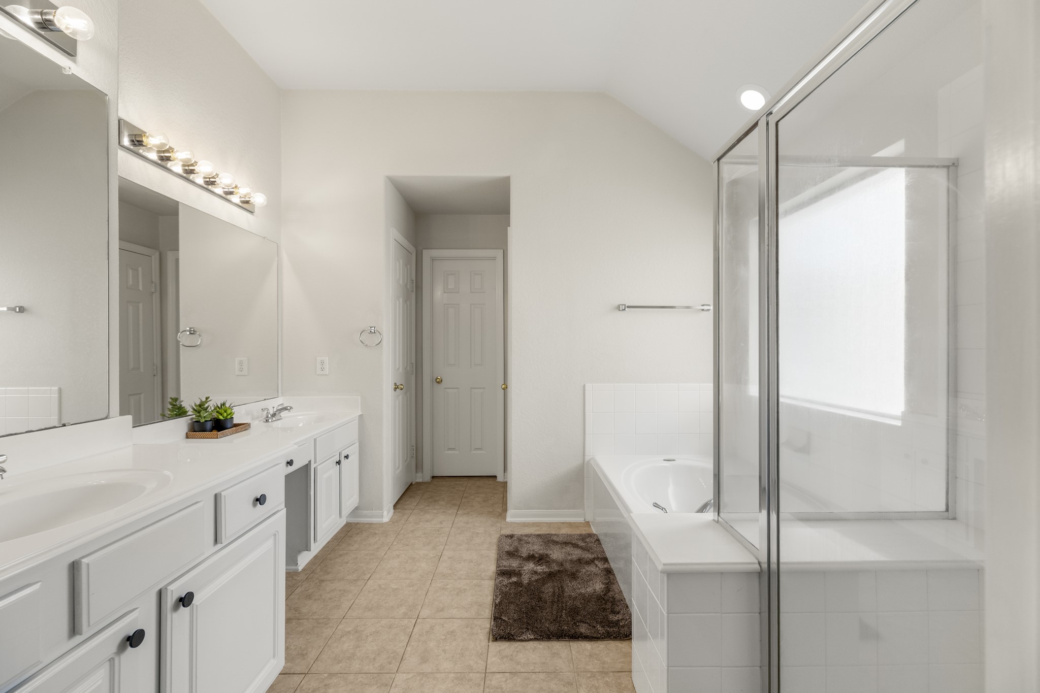 3422 Falcon Trail Court Spring, TX 77373 - Photo 19 of 35 a bathroom with a double vanity sink and mirror