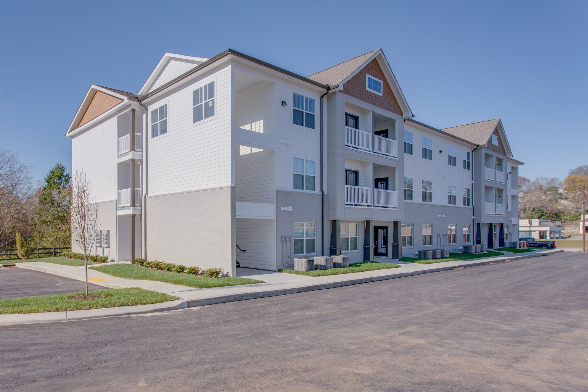 6411 Charlotte Rd Circle, Unit 304 Nashville, TN 37209 - Photo 1 of 15 a front view of a building with a street