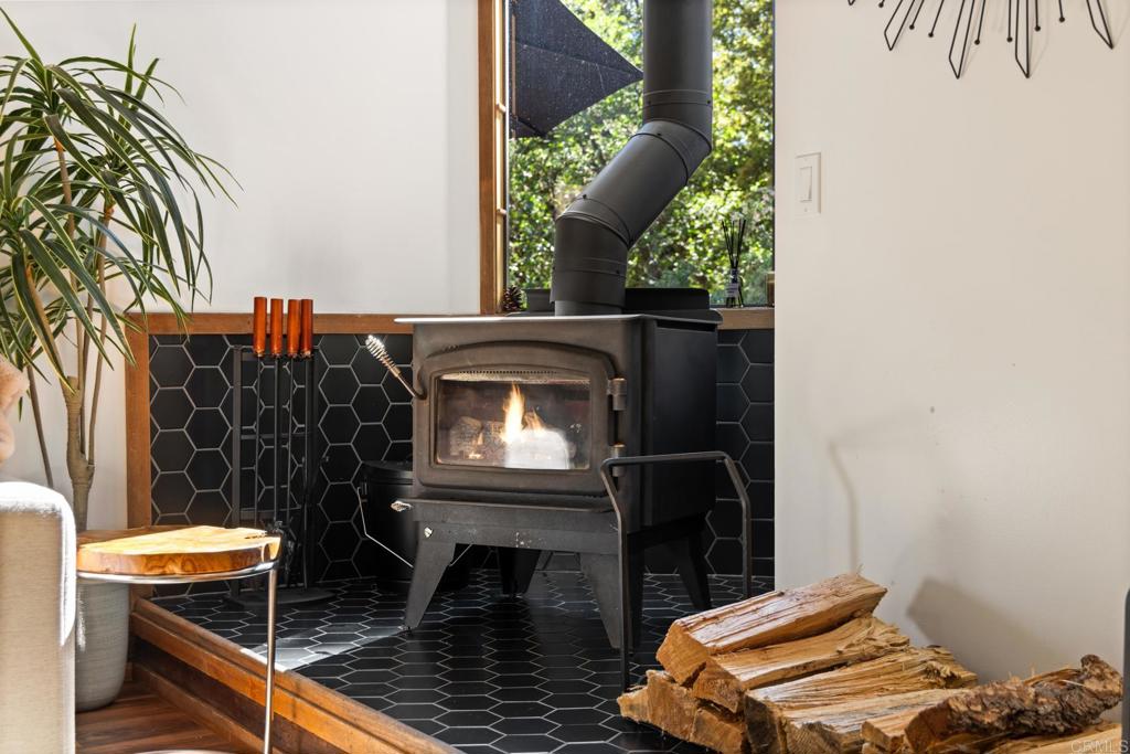 25650 Glen Road Idyllwild, CA 92549 - Photo 18 of 32 view of backyard with table and chairs and potted plants