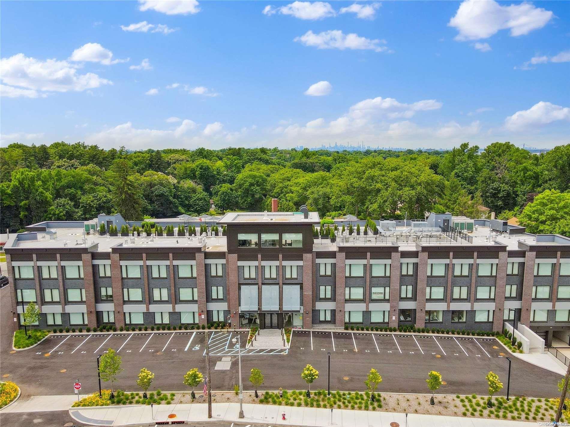 218 Middle Neck Road, Unit 105 Great Neck, NY 11021 - Photo 1 of 33 a view of a city from a balcony