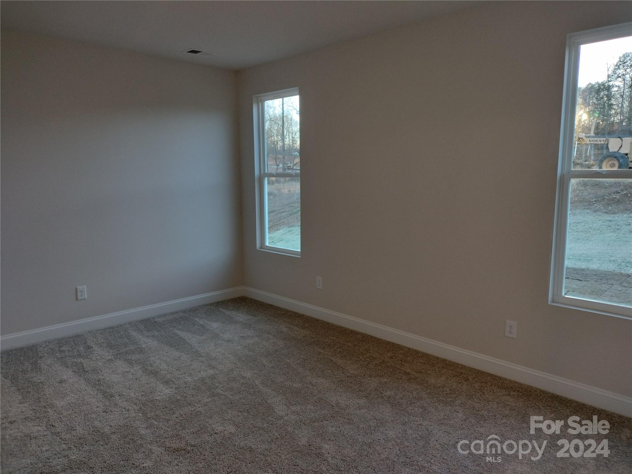252 Hamrick Road, Unit 10 Cramerton, NC 28056 - Photo 17 of 37 an empty room with windows