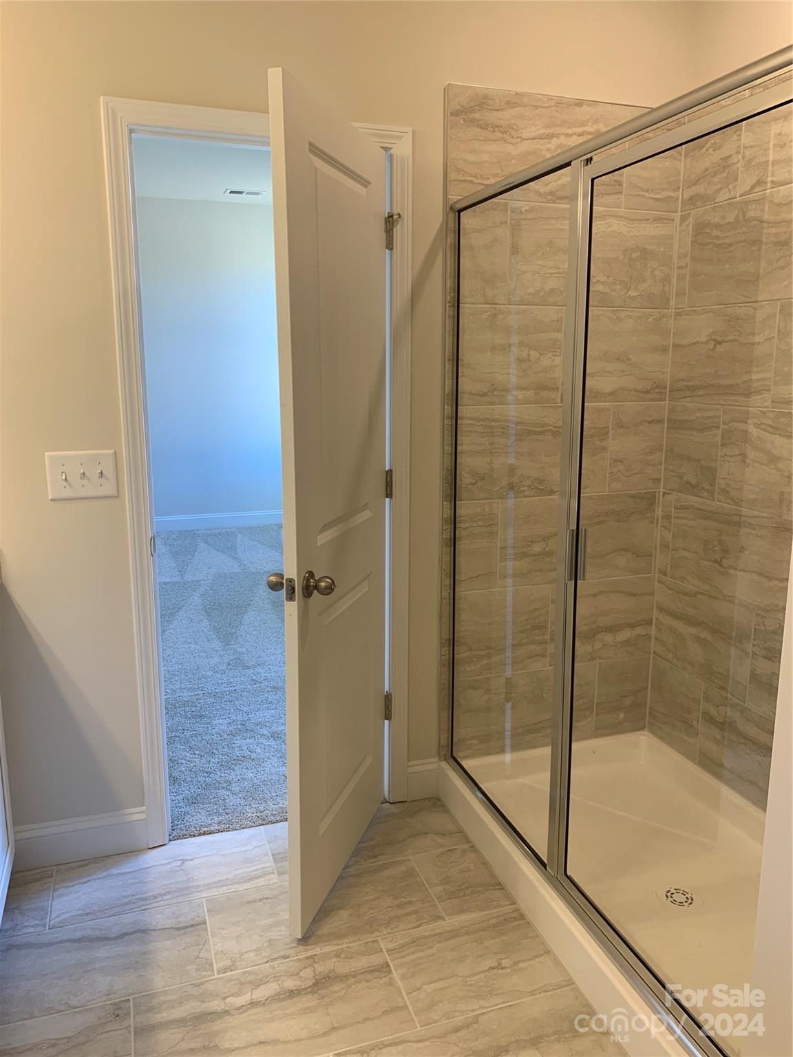 252 Hamrick Road, Unit 10 Cramerton, NC 28056 - Photo 35 of 37 a bathroom with a shower