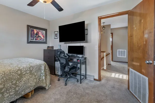 a view of balcony with furniture
