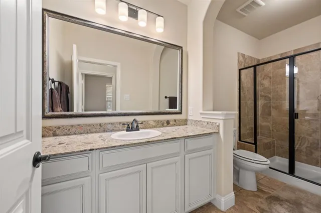 a view of storage and utility room with washer and dryer