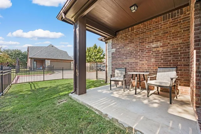 a view of a porch with a backyard