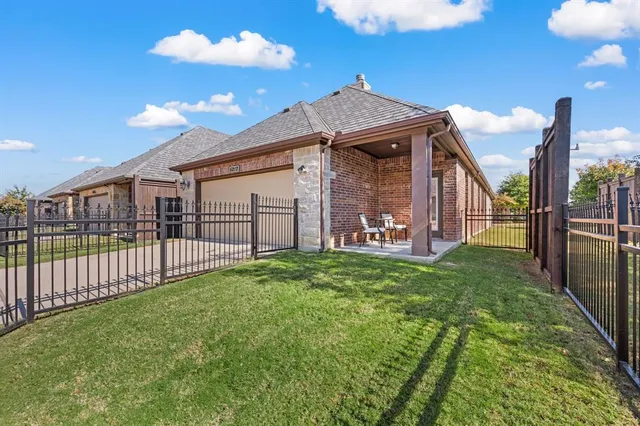a view of a backyard of a house