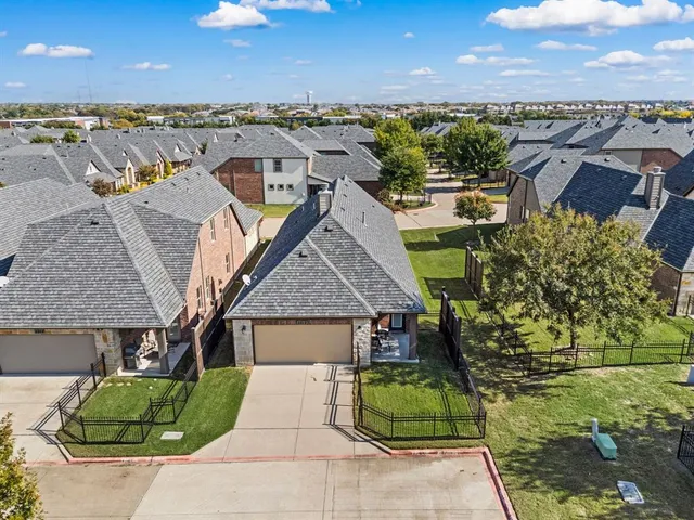 an aerial view of multiple house