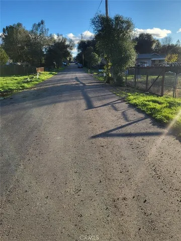 a view of a yard with a house