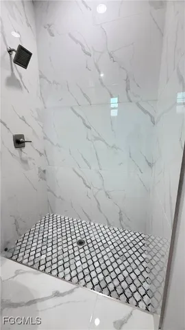 en suite bathroom with a shower