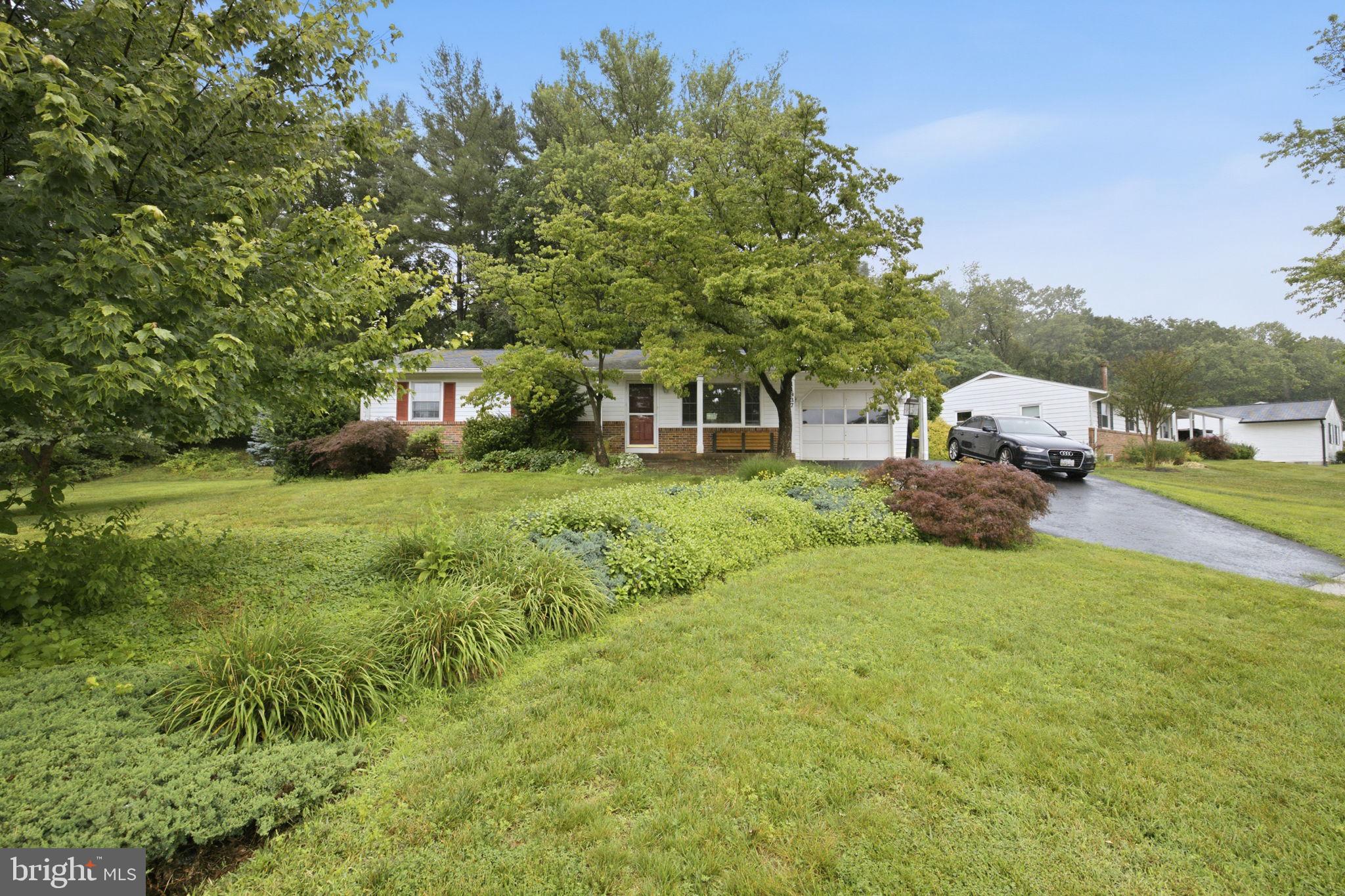 11937 Bayswater Road Gaithersburg, MD 20878 - Photo 53 of 55 Charming home amidst lush greenery.