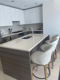a kitchen with a sink and cabinets