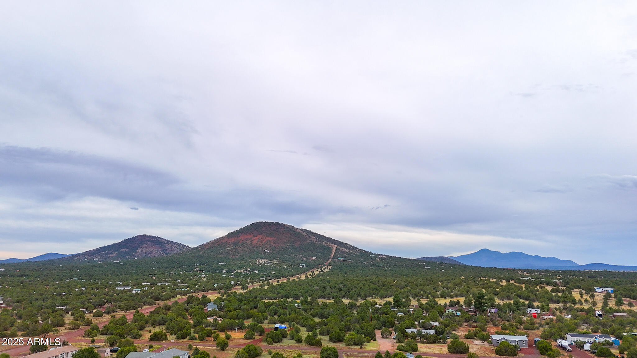 908 Hoctor Road, Unit 59 Williams, AZ 86046 - Photo 9 of 17 a view of a city with mountains in the background