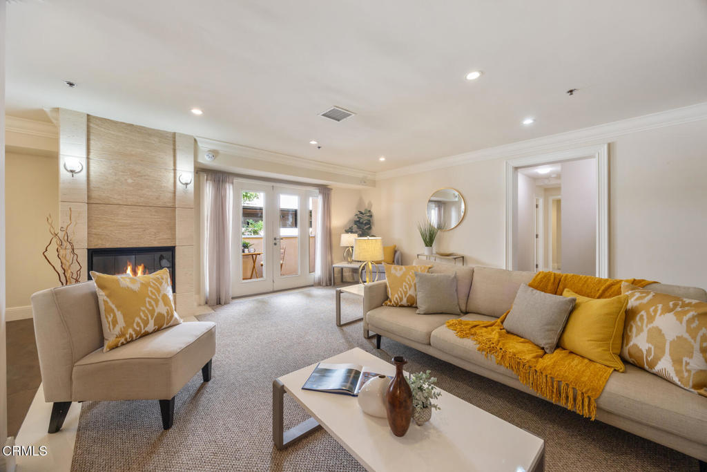 120 South Mentor Avenue, Unit 202 Pasadena, CA 91106 - Photo 2 of 40 a living room with furniture