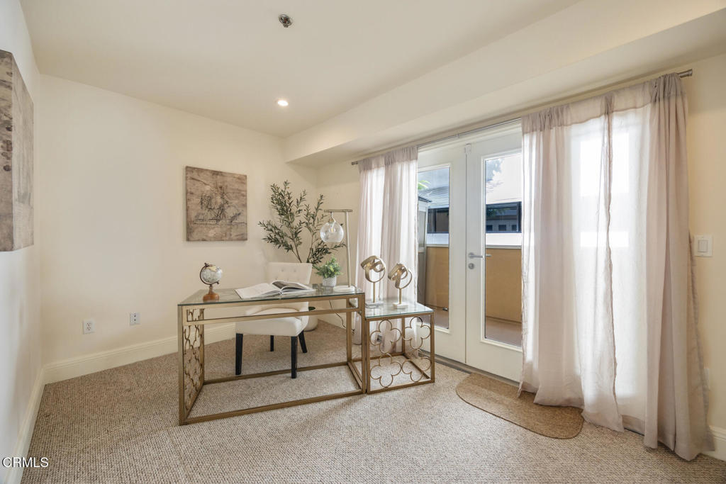 120 South Mentor Avenue, Unit 202 Pasadena, CA 91106 - Photo 24 of 40 a workspace with furniture and a window