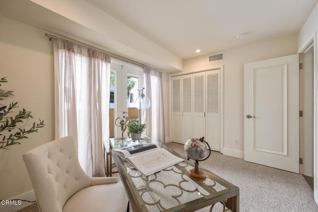 120 South Mentor Avenue, Unit 202 Pasadena, CA 91106 - Photo 25 of 40 a living room with furniture