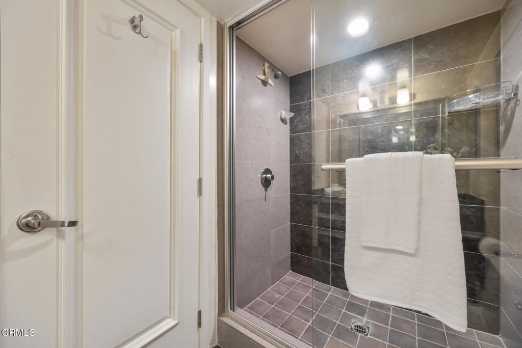 120 South Mentor Avenue, Unit 202 Pasadena, CA 91106 - Photo 27 of 40 a bathroom with a shower