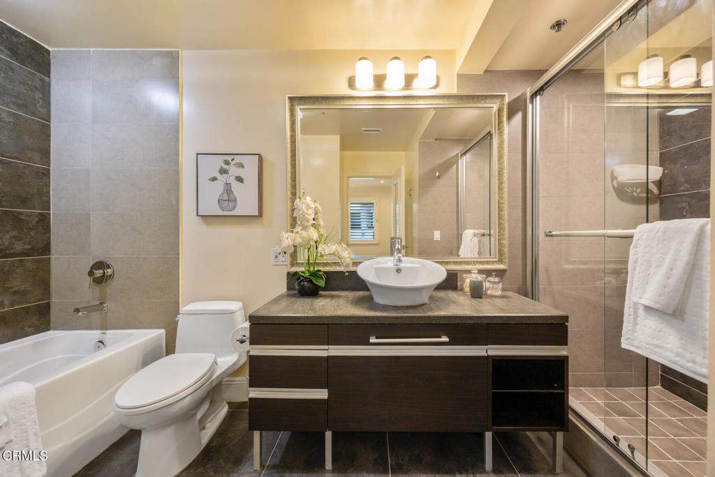 120 South Mentor Avenue, Unit 202 Pasadena, CA 91106 - Photo 31 of 40 a view of a dining room with furniture